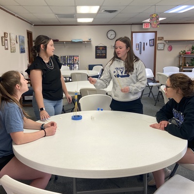 4-H Ambassadors work together on a project to develop teamwork and communication skills.