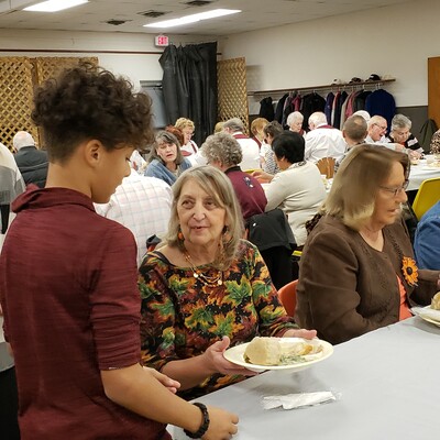 Students serving lunch- Paying It Forward!
