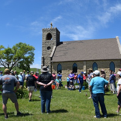 Attendees at St. Joseph s Historic Church learning about cemetery cleaning