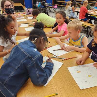 Students at Eisenhower elementary school's After School Program enjoy an art class by JCAC!