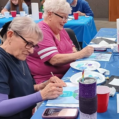 Ladies at the Senior Painting Class having fun together.